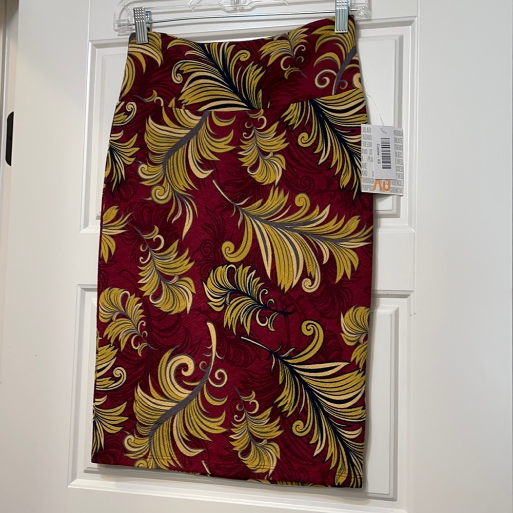 Lularoe “Cassie” skirt, tropical feather print